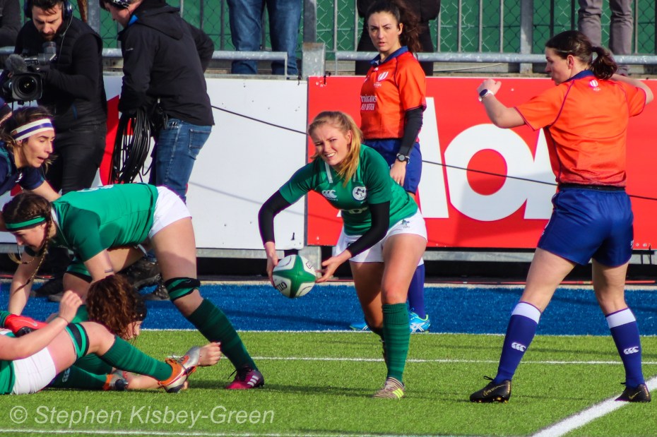 Kathryn Dane clears the ball out from a ruck against Scotland. Photo: Stephen Kisbey-Green